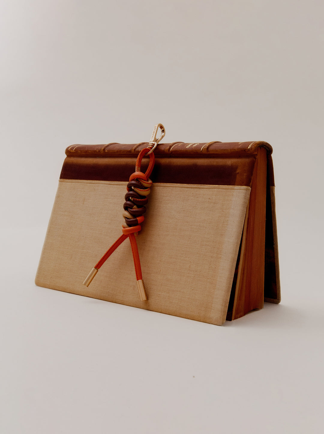 Bag charm Noga cuir tressé